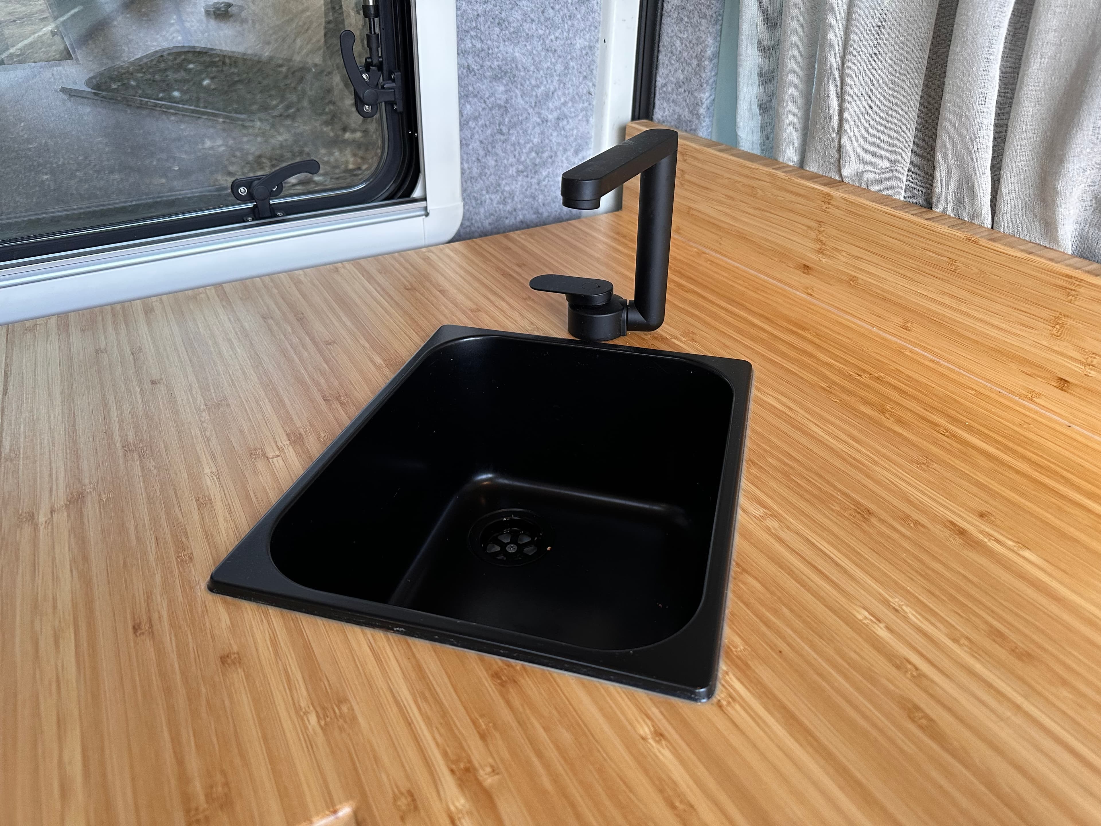 Campervan kitchen sink with tap